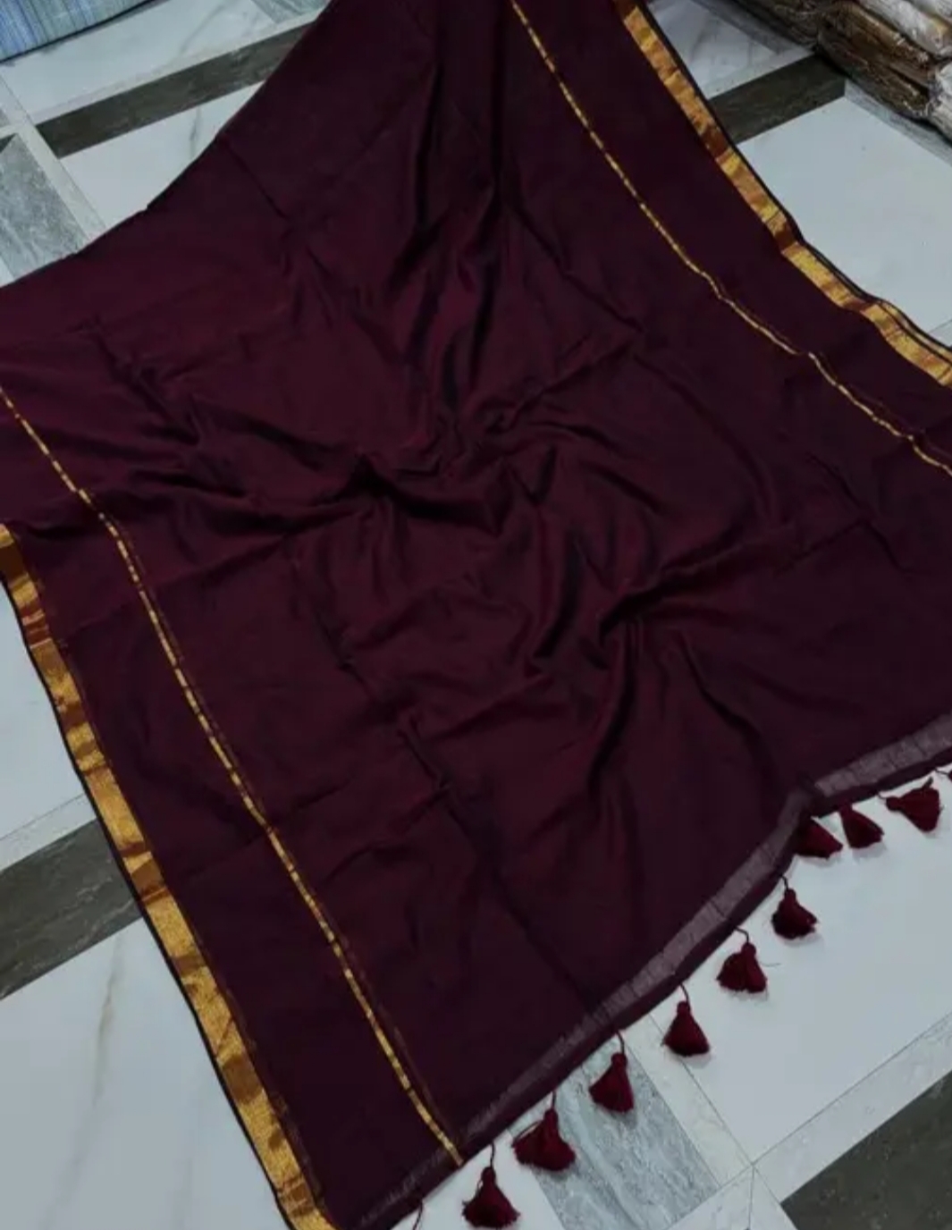 Maroon mul cotton saree with zari border